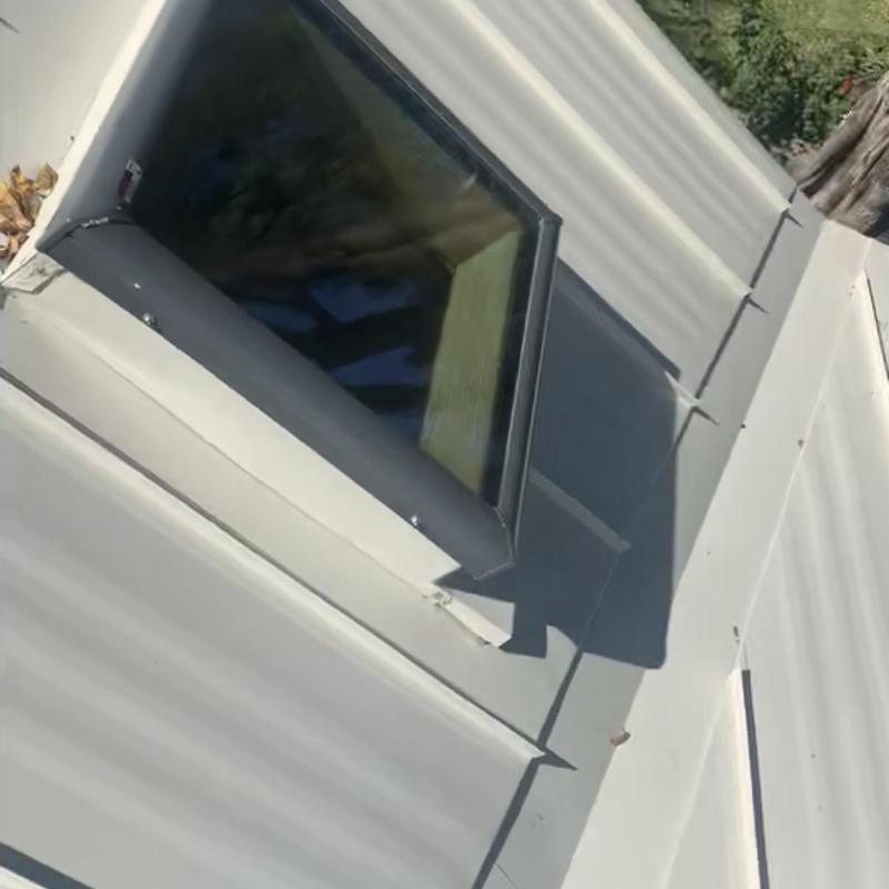 VELUX 2222 curb mounted skylight with flashing kit on metal roof