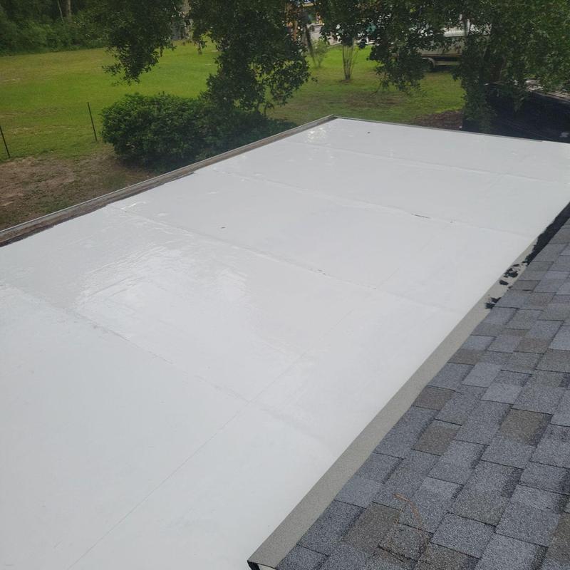 TPO flat roof membrane installation on residential roof TPO flat roof membrane installation on residential roof