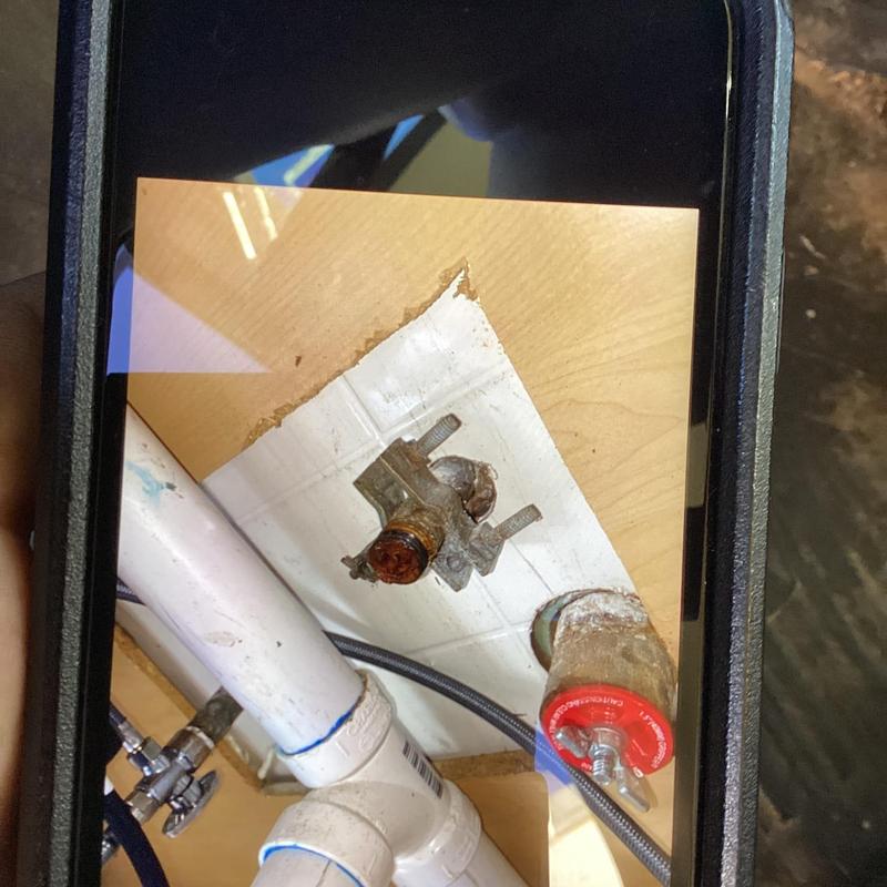 Cold side straight stop under kitchen sink rusted and corroded