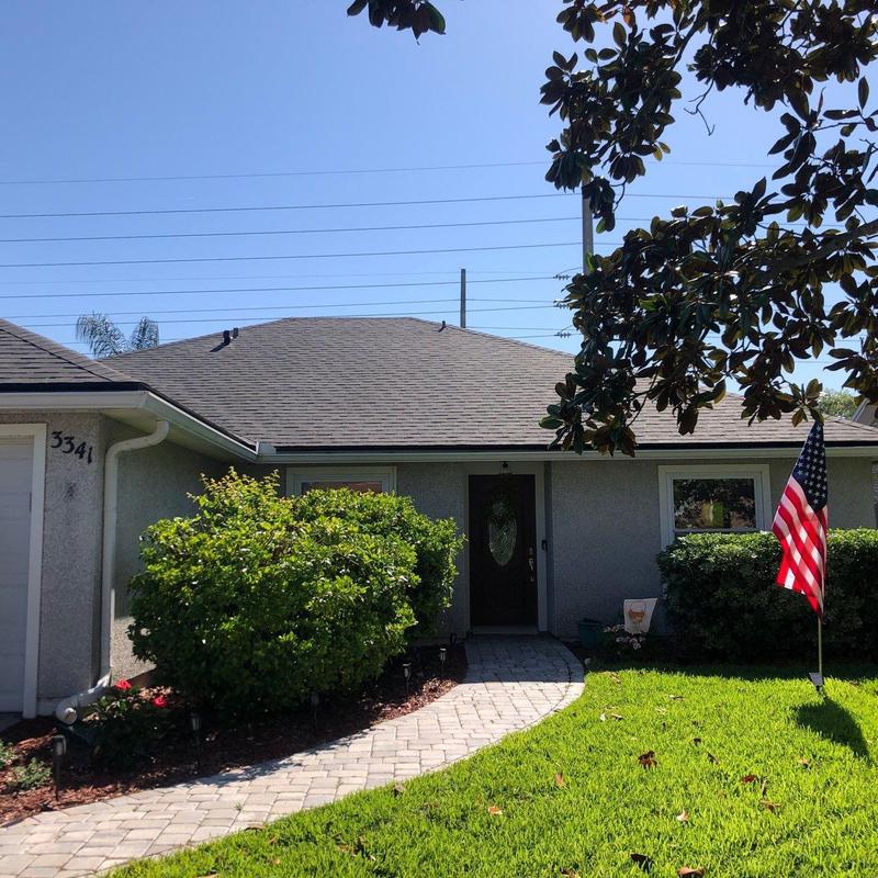Asphalt shingle roof on single-story house Asphalt shingle roof on single-story house