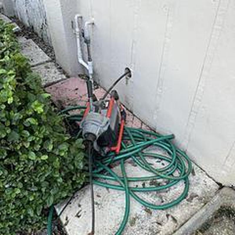 Drain cleanout with power auger and cable snake
