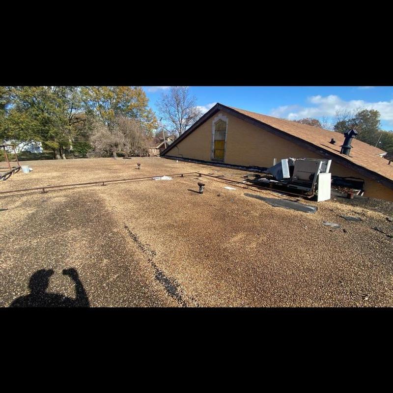 Gravel flat roof with HVAC unit and pipes inspection Gravel flat roof with HVAC unit and pipes inspection