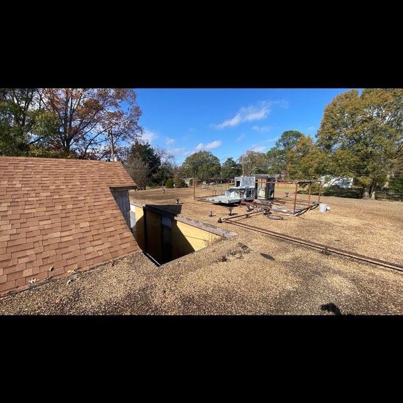 Flat roofing with HVAC unit and vent pipe inspection Flat roofing with HVAC unit and vent pipe inspection