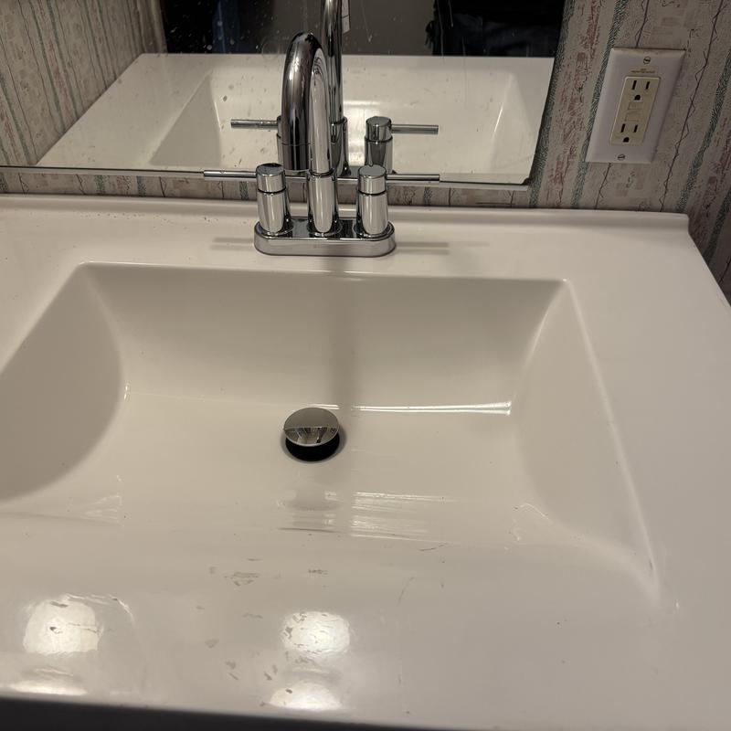 Glacier Bay chrome faucet and white vanity sink