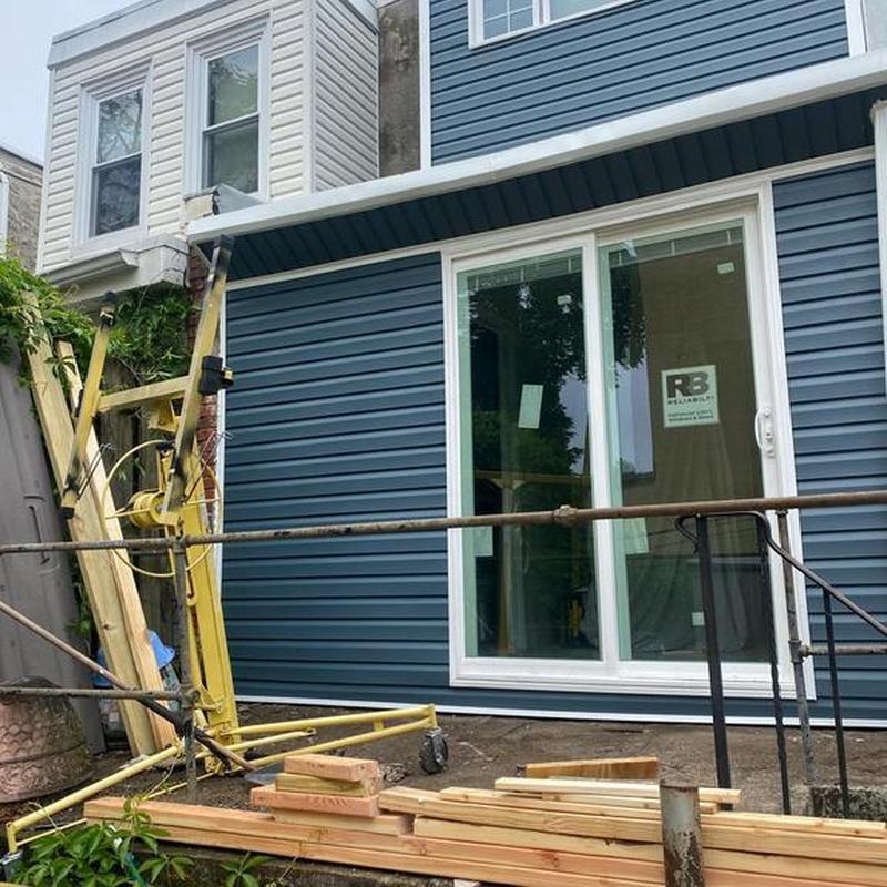 4-inch Dutchlap vinyl siding installation on house exterior