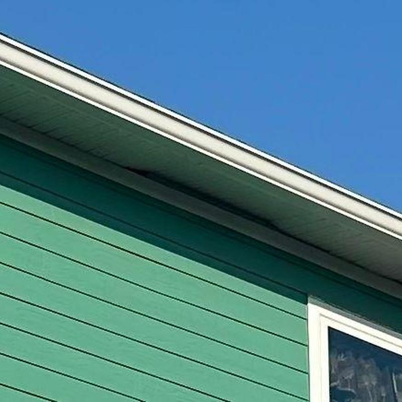 Vinyl soffit panels and J channel installation on house edge Vinyl soffit panels and J channel installation on house edge