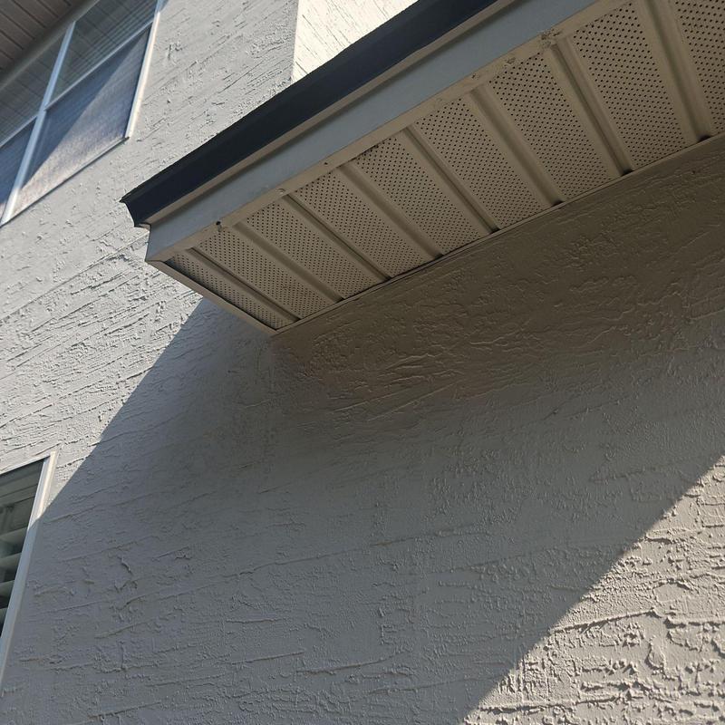 Soffit panels and fascia on residential exterior roof edge Soffit panels and fascia on residential exterior roof edge