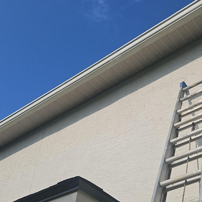Soffit system and ladder against house exterior Soffit system and ladder against house exterior