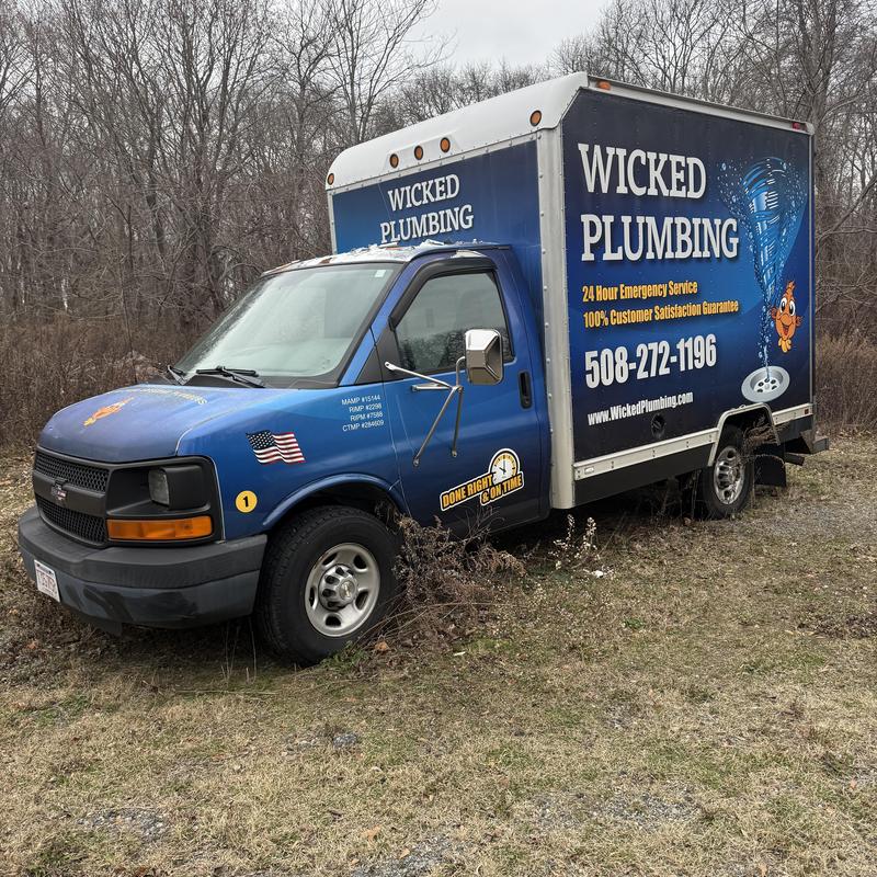 Kitchen drain clearing service truck parked outdoors Kitchen drain clearing service truck parked outdoors