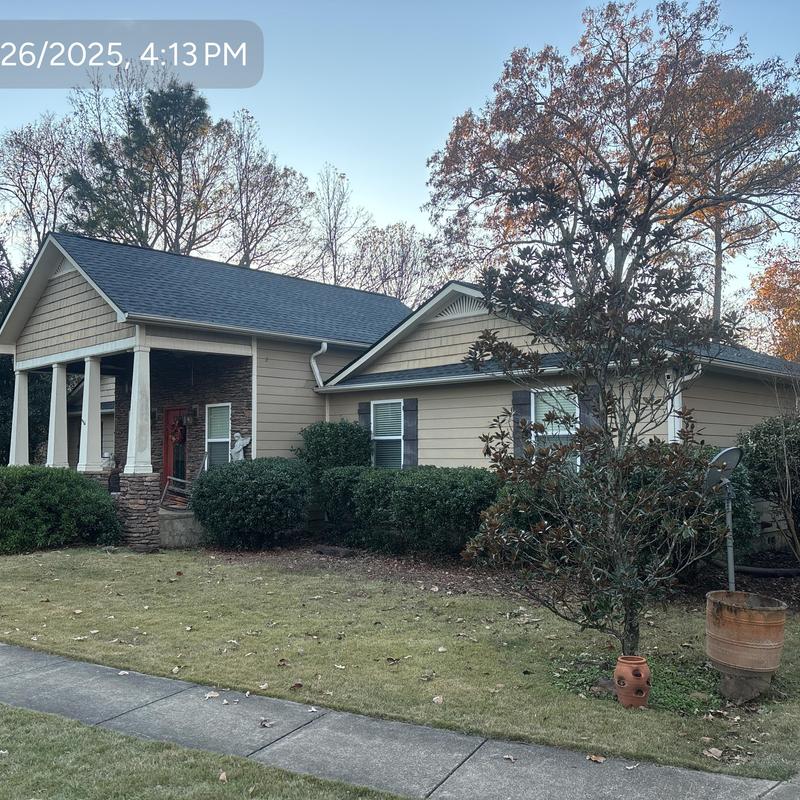 Timberline HDZ roof shingles with repaired gutters Timberline HDZ roof shingles with repaired gutters