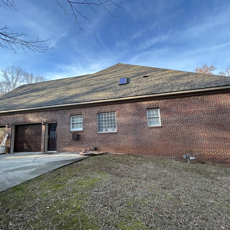 Owens Corning Estate Grey Duration roof shingles on brick home Owens Corning Estate Grey Duration roof shingles on brick home