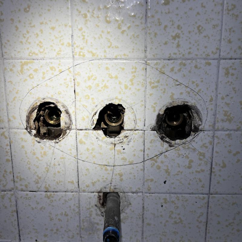 Shower valve rough-in with three supply lines in tiled wall
