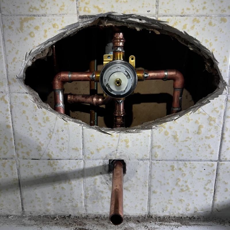 Delta shower valve with copper piping in wall cavity