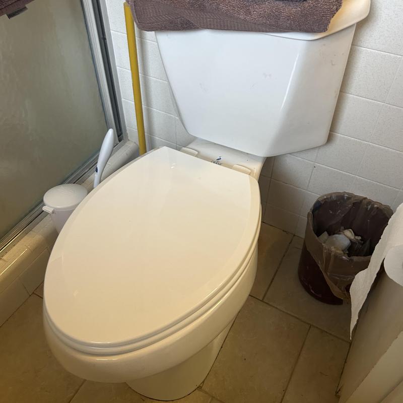 Toilet base with new wax seal in Hot Springs bathroom