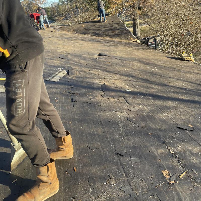 Roof underlayment removal on residential roof install