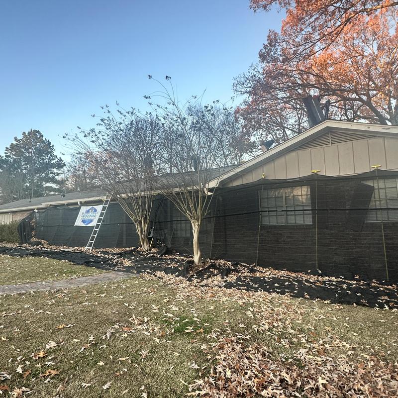 Roof shingles installation on residential home in fall