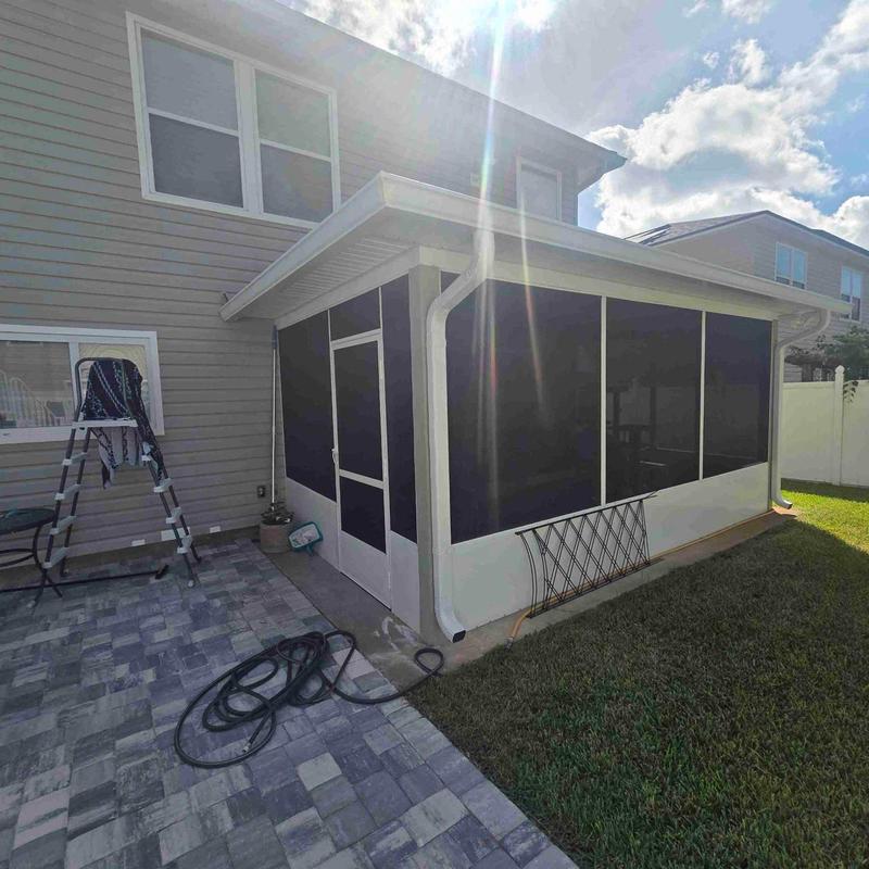 6K style gutters installed on screened patio exterior 6K style gutters installed on screened patio exterior