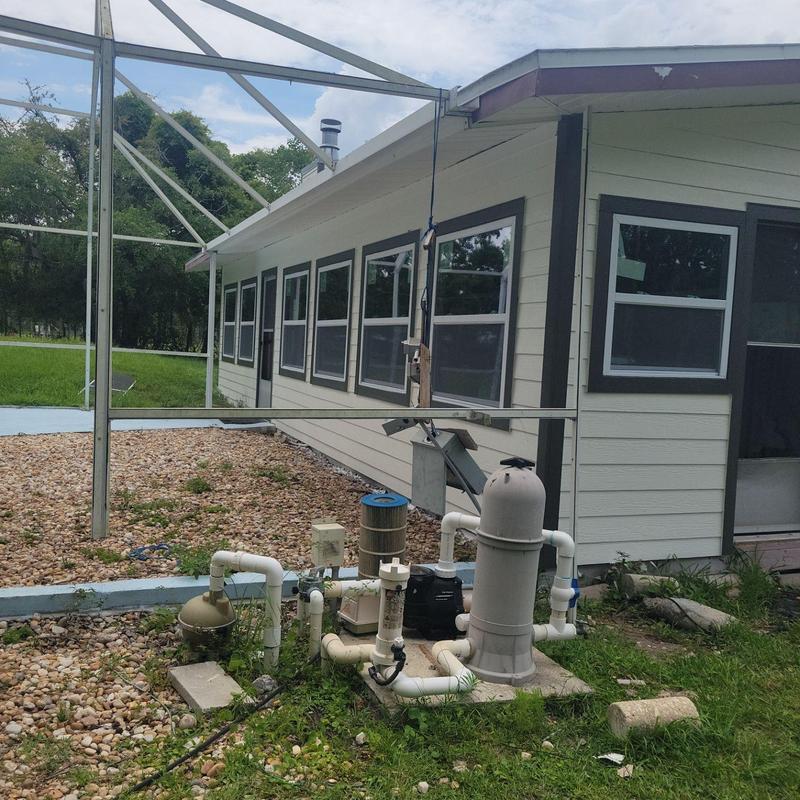 Pool filtration system with new fiber cement lap siding Pool filtration system with new fiber cement lap siding