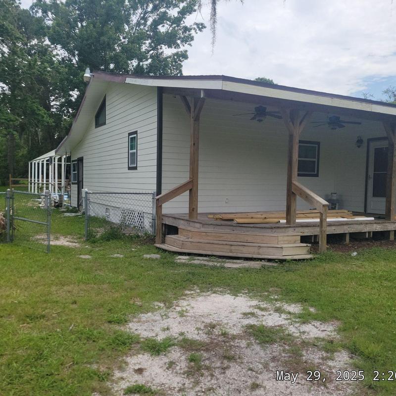Fiber cement lap siding on residential porch Fiber cement lap siding on residential porch