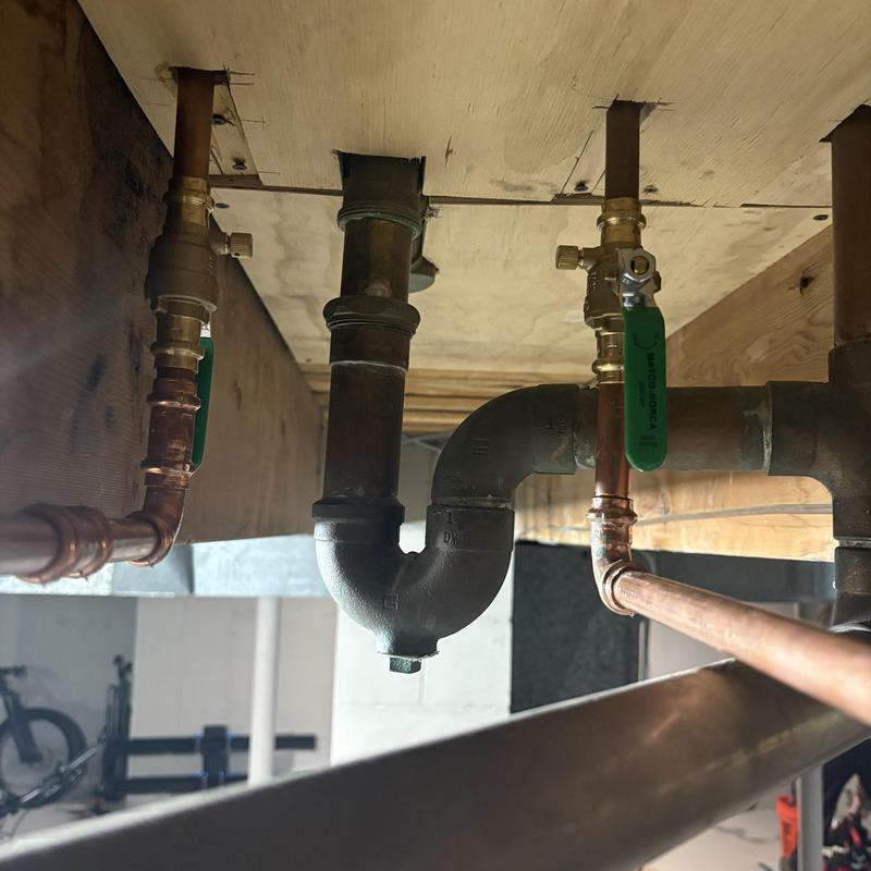 Shower riser and copper piping with ball valves installed