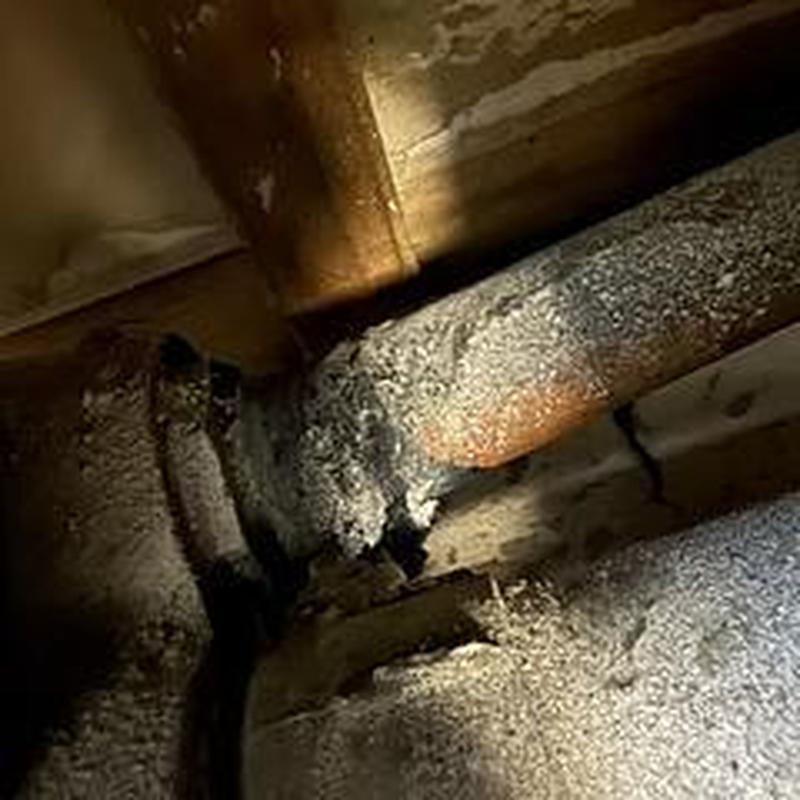 4-inch cast iron sewer stack with corrosion damage