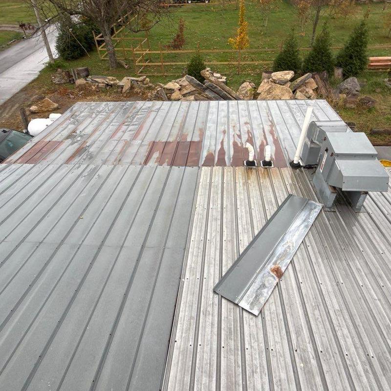Metal roof panels with rust and loose section