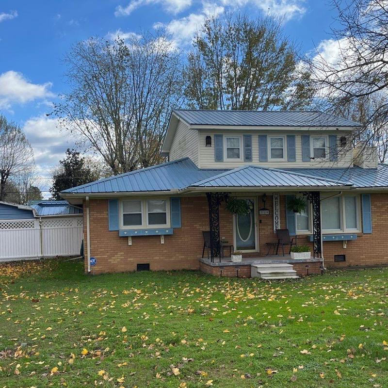 Metal roofing with inspected flashing and ventilation balance