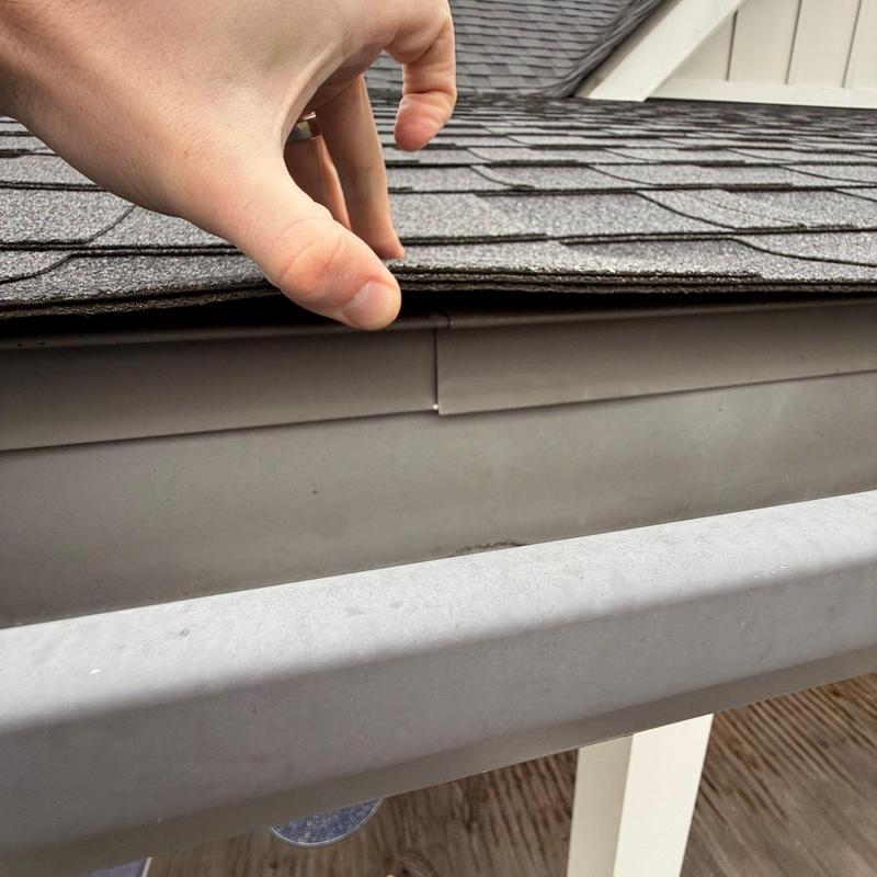 Roof shingles and gutter inspection for damage