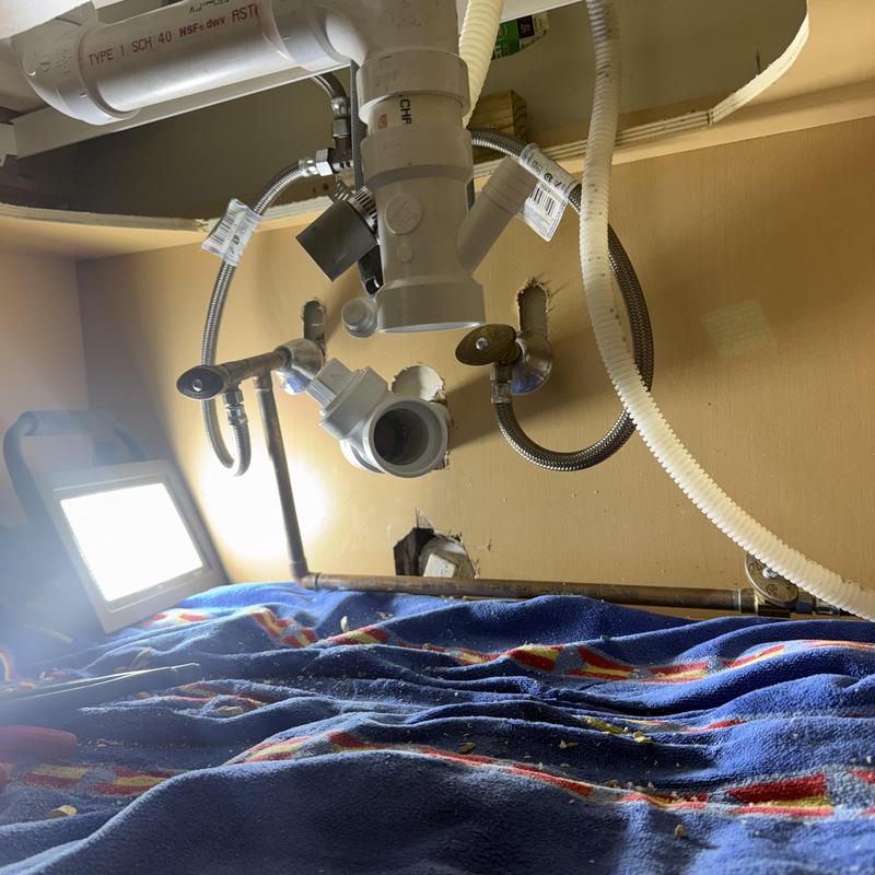 Kitchen drain pipes with leak repair work