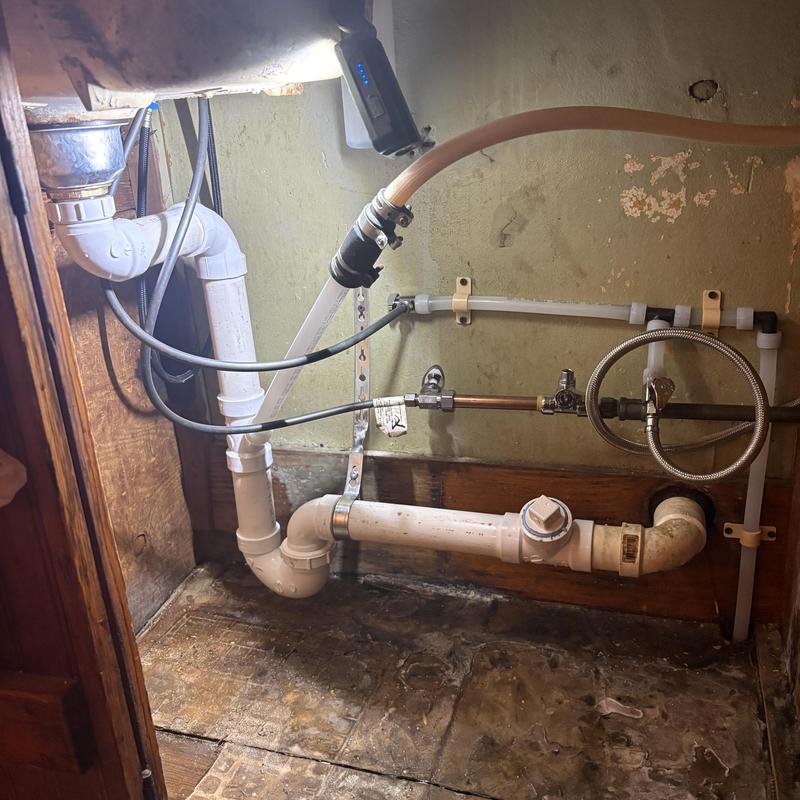 Dishwasher tee PVC drain and PEX waterlines under sink Dishwasher tee PVC drain and PEX waterlines under sink