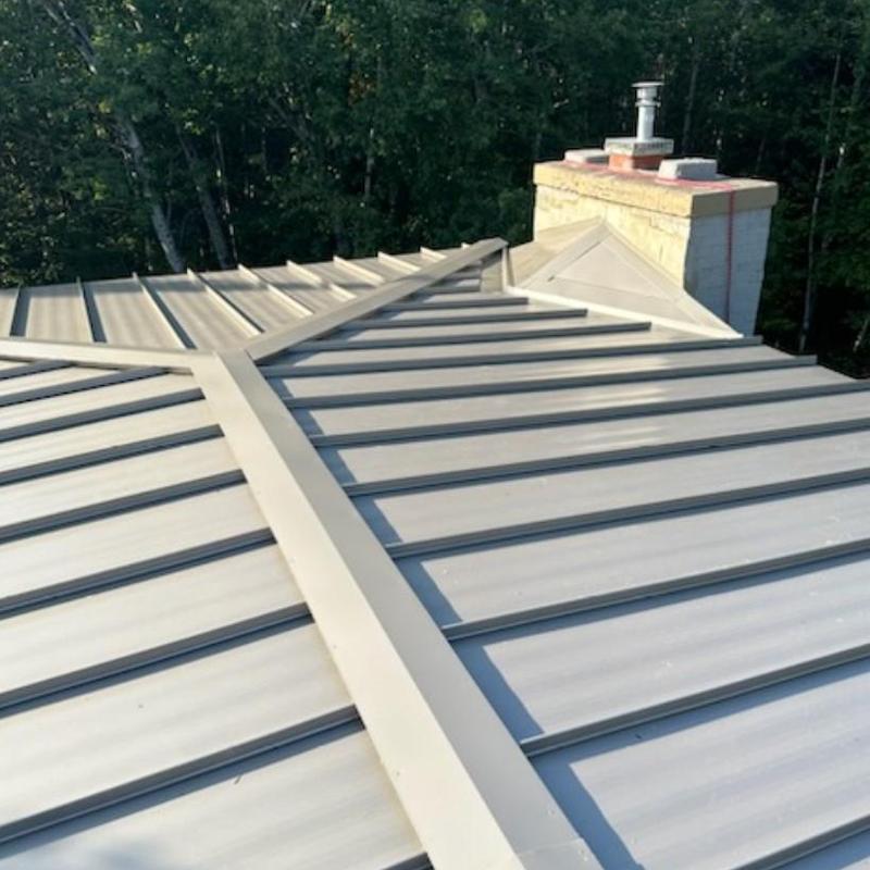 24 gauge standing seam steel roof with chimney nearby 24 gauge standing seam steel roof with chimney nearby