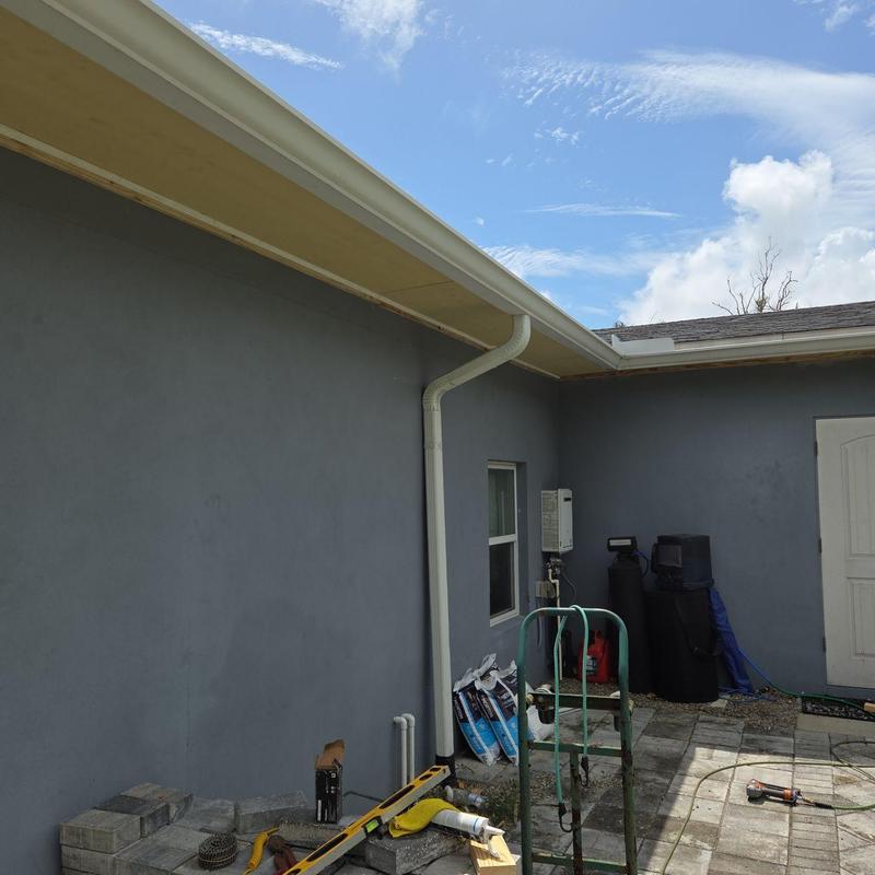 Fiber cement soffit panel installation under eaves Fiber cement soffit panel installation under eaves