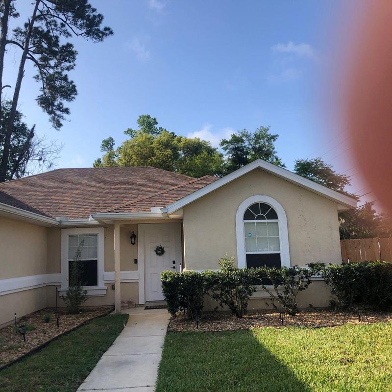 Asphalt shingle roof replacement on residential house Asphalt shingle roof replacement on residential house