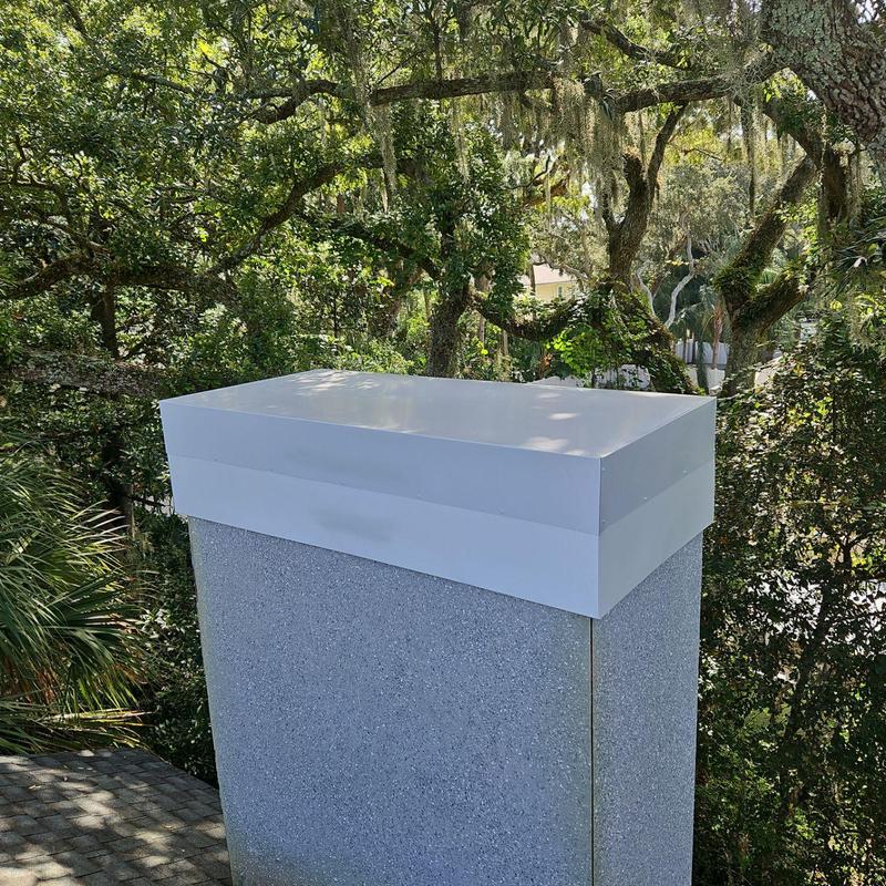 Aluminum chimney chase cover installed on roof top Aluminum chimney chase cover installed on roof top