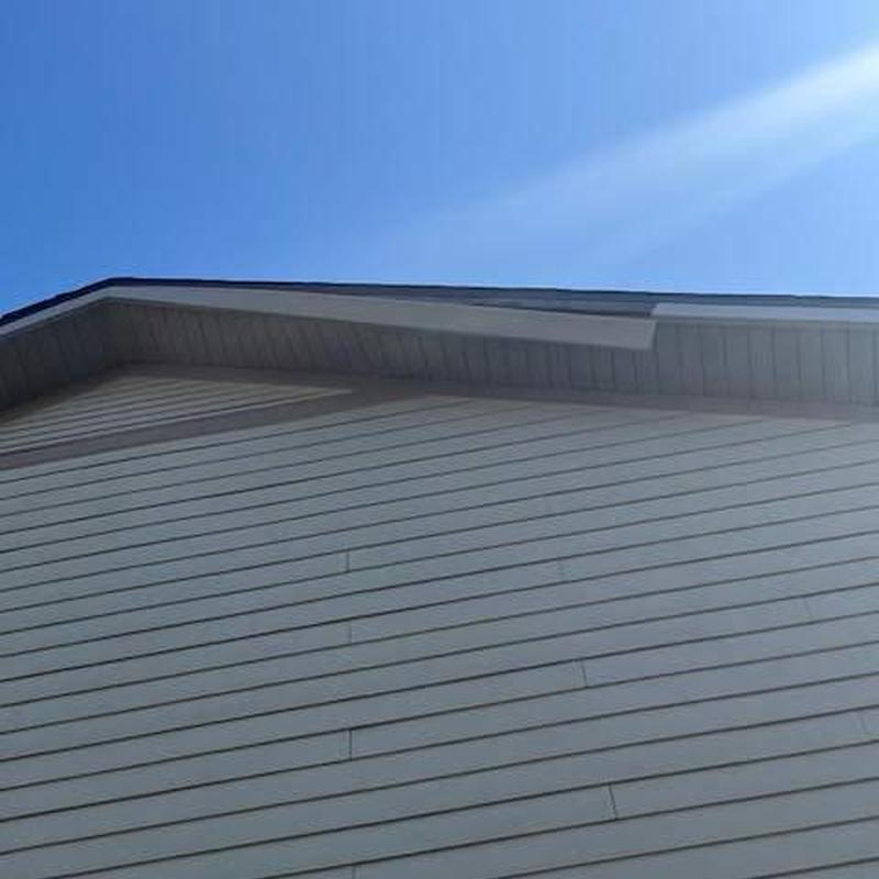 Fascia cladding on home exterior under clear sky Fascia cladding on home exterior under clear sky