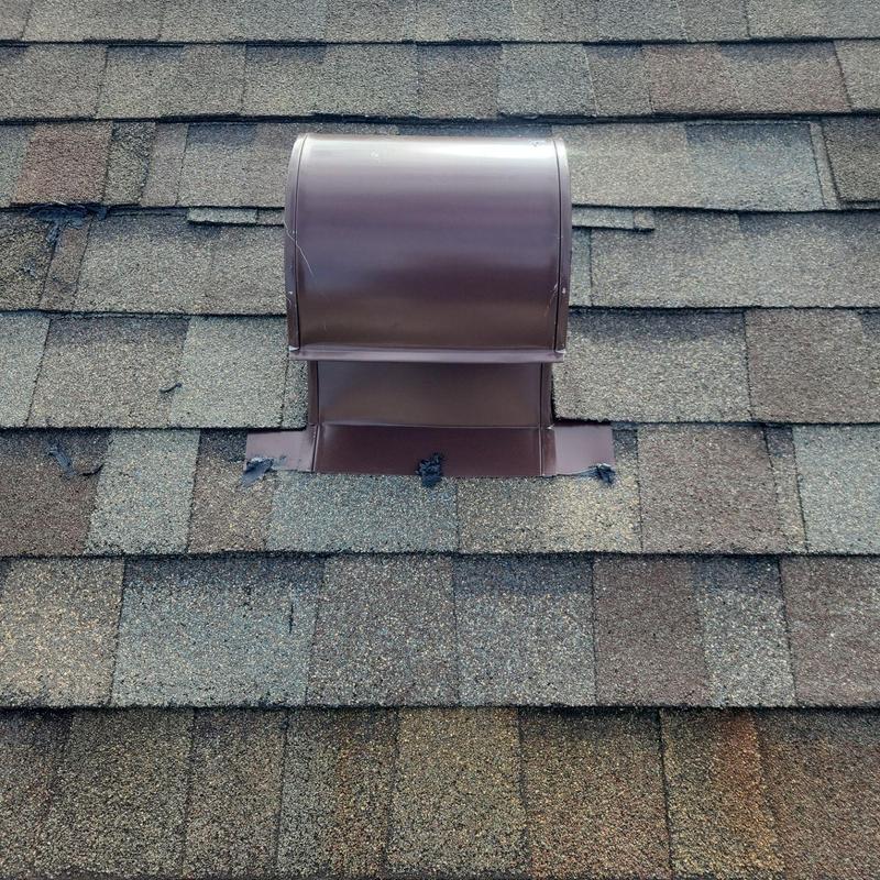 Kitchen roof vent with new shingles around it Kitchen roof vent with new shingles around it