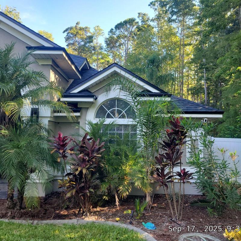 Roof shingles and gutter system on residential home Roof shingles and gutter system on residential home