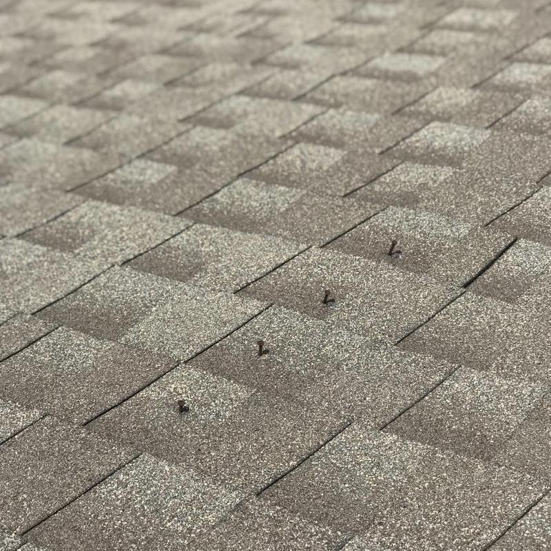 Owens Corning asphalt shingles with exposed nails