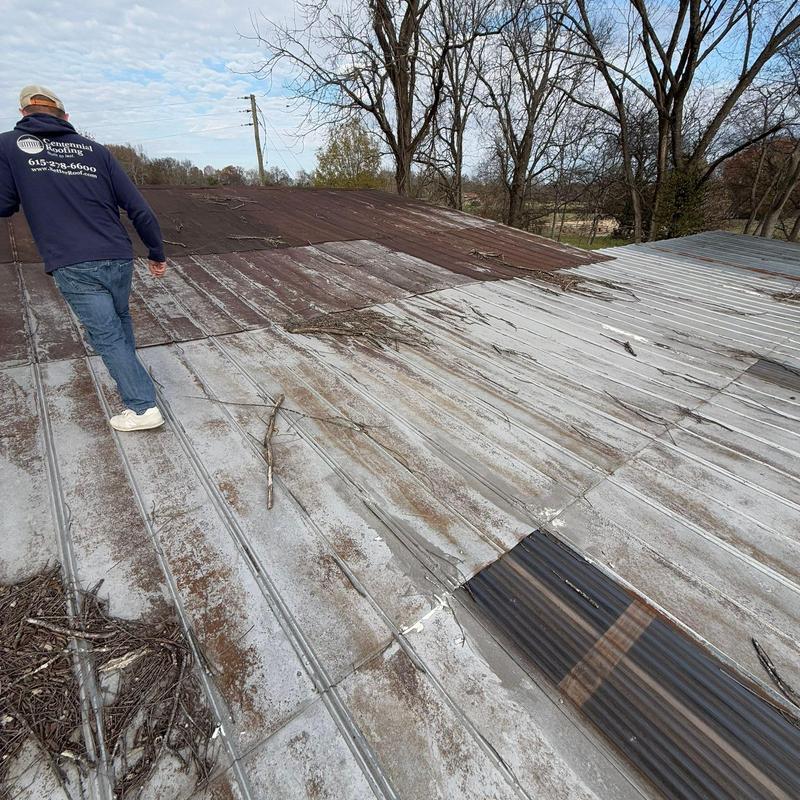 Metal roof panels inspection with debris and wear