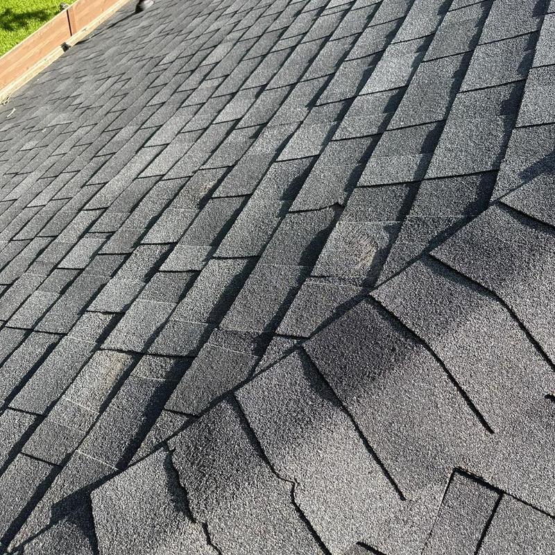 Owens Corning Duration roof shingles with hail damage
