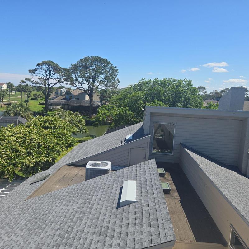 Asphalt shingle roof replacement with rooftop HVAC unit Asphalt shingle roof replacement with rooftop HVAC unit
