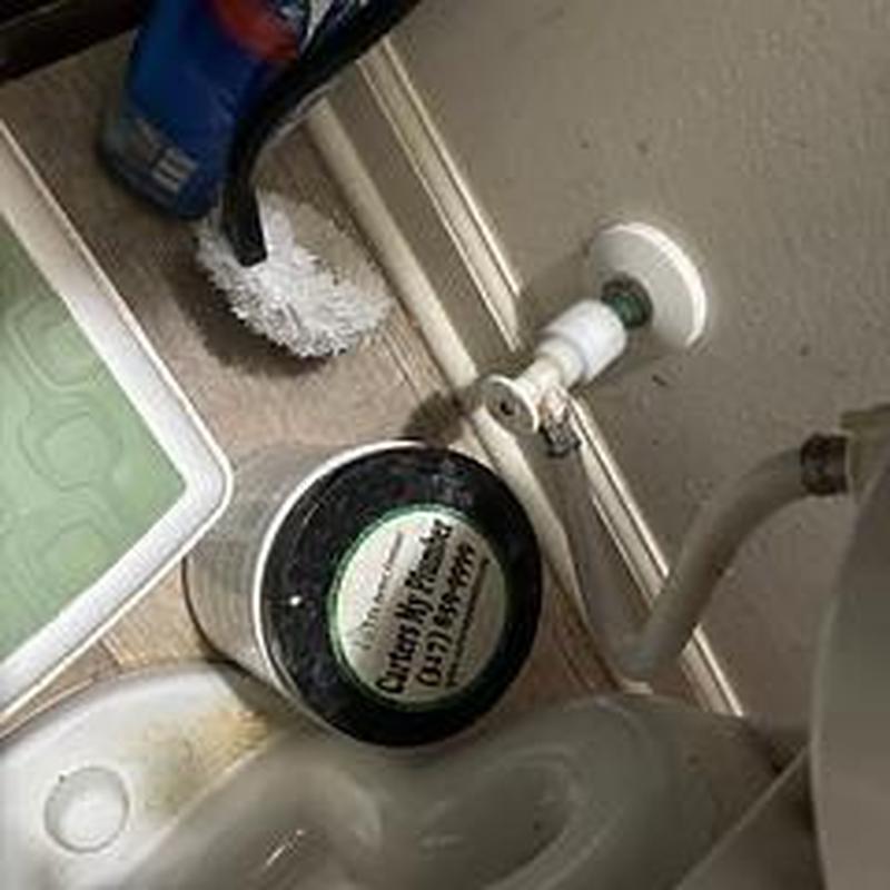 Toilet supply valve with attached water line in bathroom