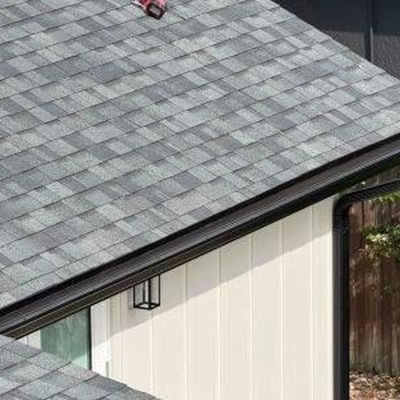 6K style gutters installed along roof edge 6K style gutters installed along roof edge