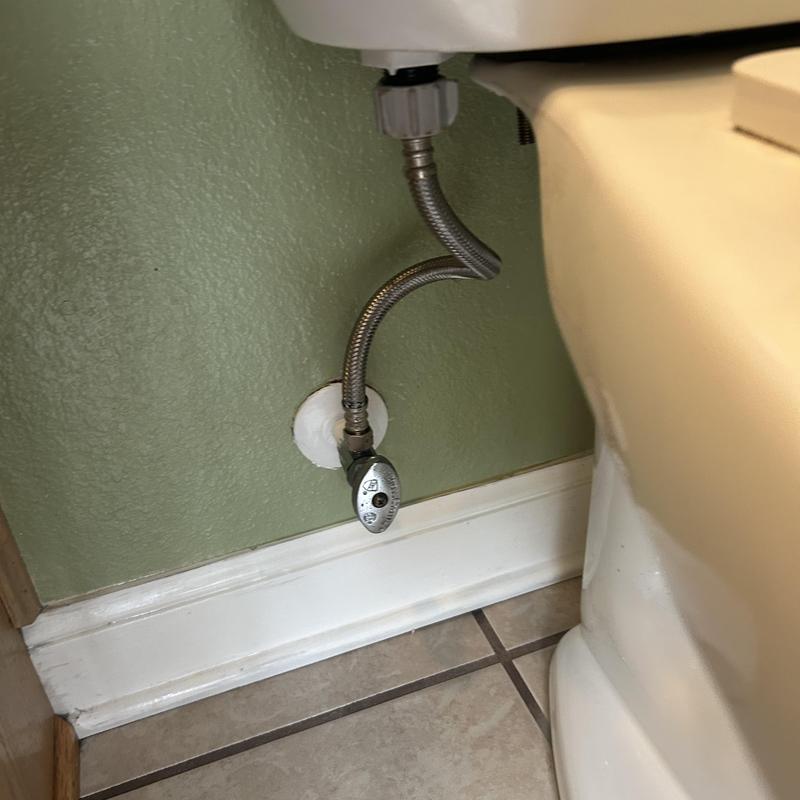 Toilet fill valve and supply line connection near floor