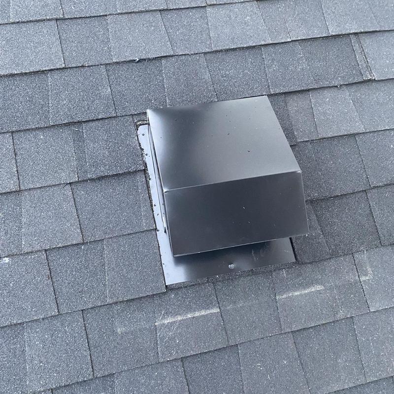 Roof exhaust vent with new flashing on shingle roof