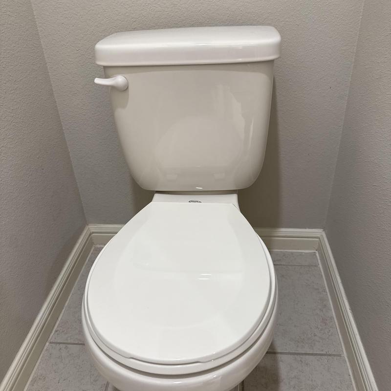 Toilet installation in small bathroom corner