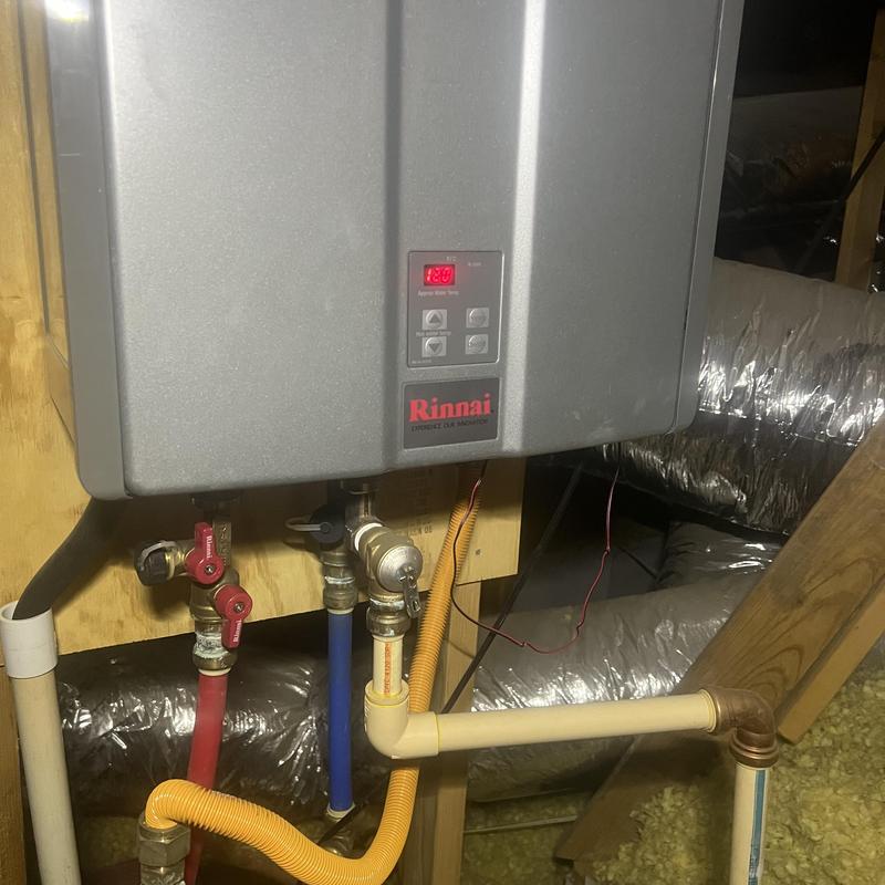 Rinnai tankless water heater with plumbing connections