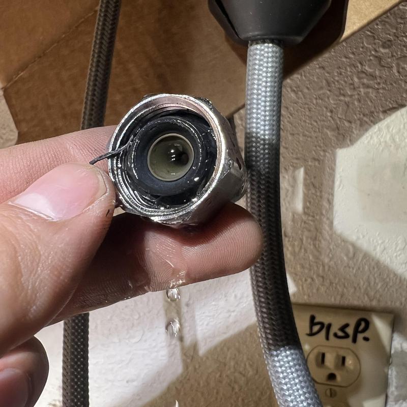 Kitchen faucet connector with leaking hose fitting