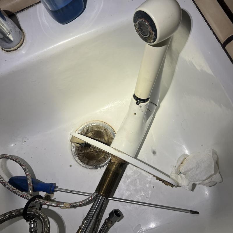 Kitchen sink pullout faucet with tools in sink