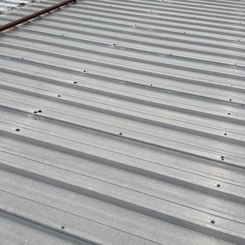 Metal roofing hail damage and fastener impact points